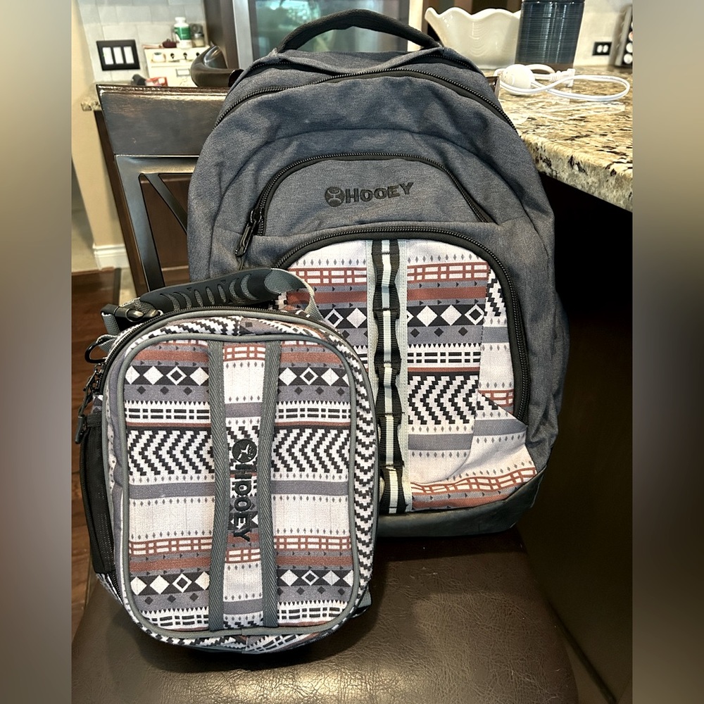 Hooey backpack and lunch kit, both are in new condition used for school.